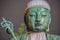 Detail of Nure Botoke Jizo æ¿¡ã‚Œä» Wet Jizo Bodhisattva Bronze statue at Zenko-ji Temple complex in Nagano